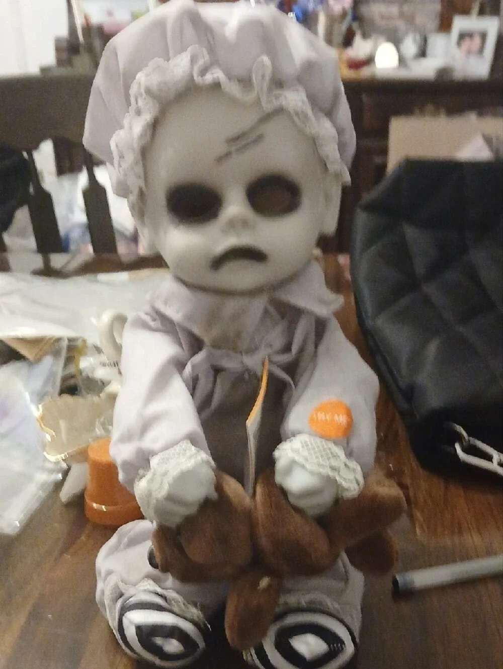 Animated Head Pulling Doll - Gray with Black and Brown Accents